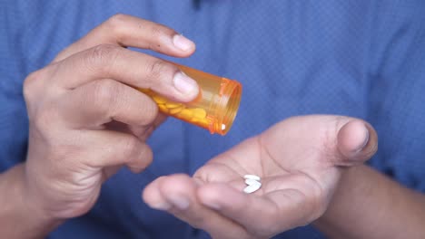 person taking pills