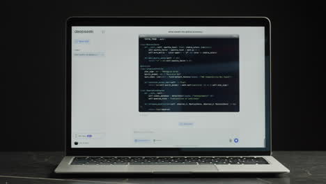 laptop displaying code in a terminal/console window
