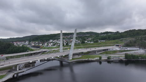 farrisbrua bridge under cloudy sky in larvik, norway - aerial drone shot