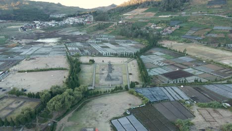 Iconic-Arjuna-Temple-in-Indonesia,-aerial-orbit-view