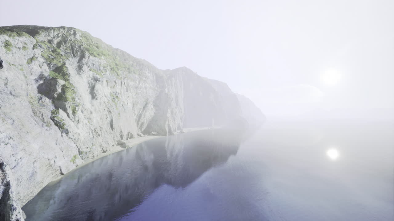 Misty coastline at dawn with cliffs and calm waters in serenity