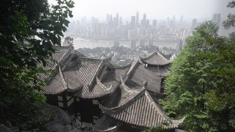 wide angle overview of contrasting ancient and modern chongqing city skyline and roof top