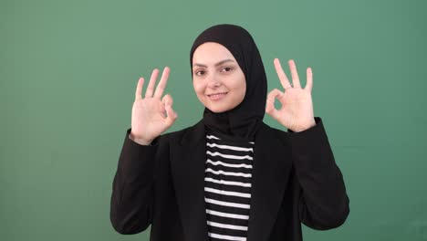 muslim woman perfect sign