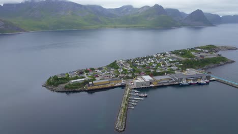 Aerial-sideway-shot-of-Husoy-on-Senja-Island,-during-summer