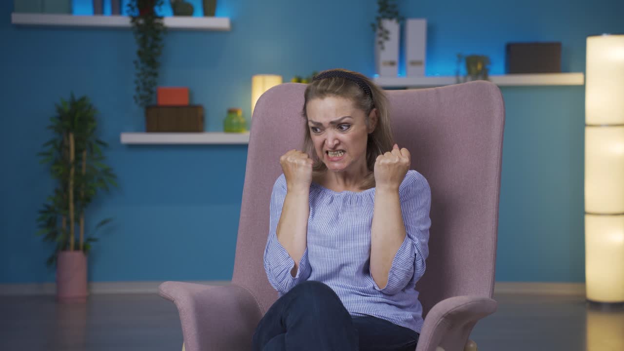 The woman having a nervous breakdown is angry and does not feel well.