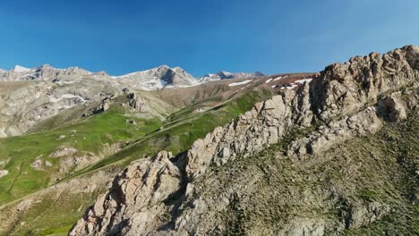 aerial view of rocky mountains in summer, peaceful nature scene