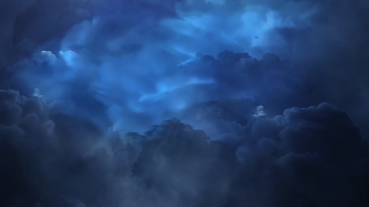 Lightning Flashes  In Storm Clouds Thunderstorm