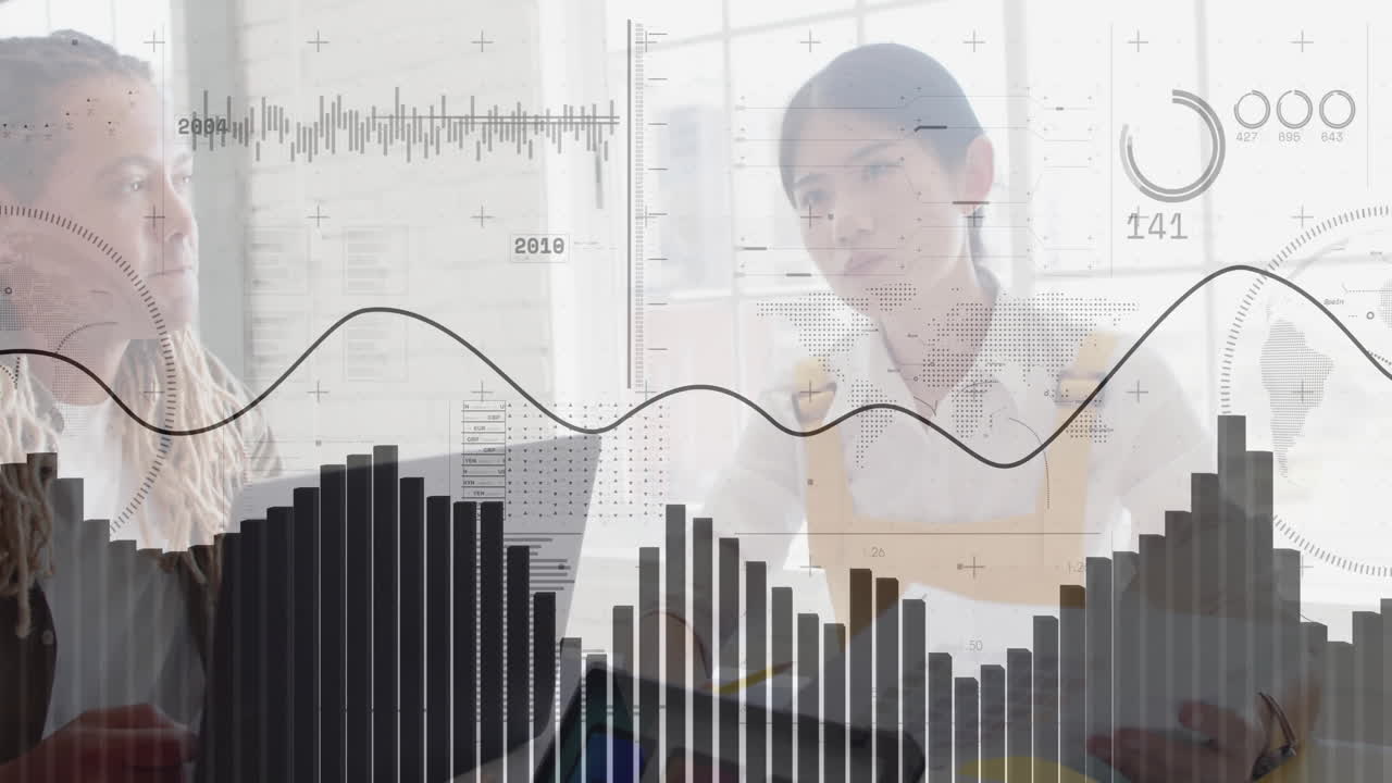 Analyzing data charts and graphs, businesswoman working in modern office environment