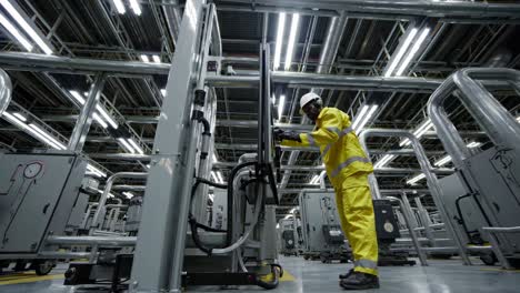 industrial maintenance personnel in a power plant control room