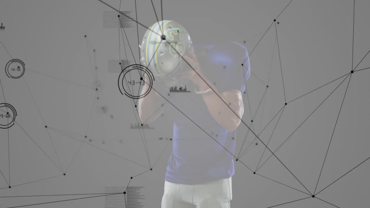 Male athlete raising football helmet activating nodes charts shifting around him in sports tech