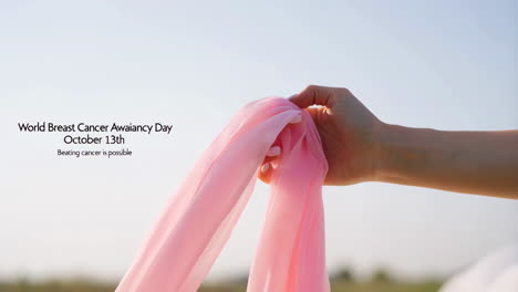 world breast cancer awareness day with pink ribbon