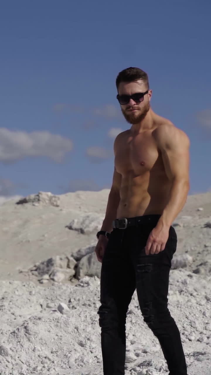 Male with naked nude torso. Healthy athletic fitness model posing outdoor