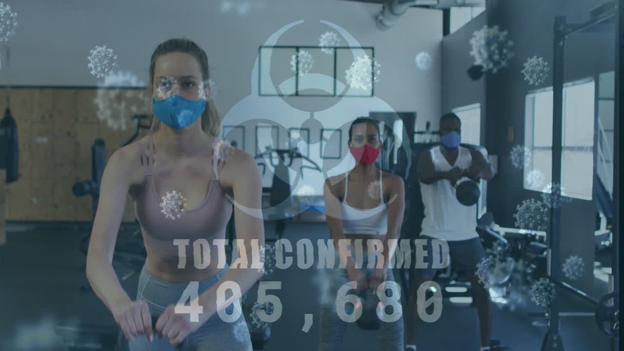 코로나19 세포가 다양한 그룹 위에 떠다니고 마스크를 쓰고 운동하는 애니메이션