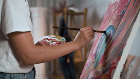 artist painting with a brush