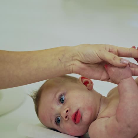 doctor examining baby boy