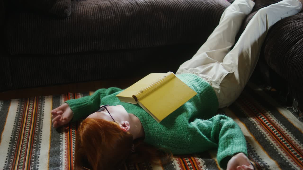 Woman Relaxing and Reading on the Floor