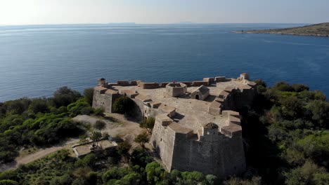 Medieval-architecture-of-fortress-with-sea-view-positioned-on-coastline-of-Mediterranean