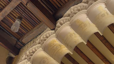 ornamental arch with arabesque design in moorish-taifa hall of aljaferia palace in zaragoza, spain