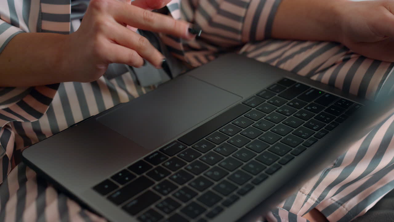 Woman hands using laptop computer closeup. Unknown manager waving on video call