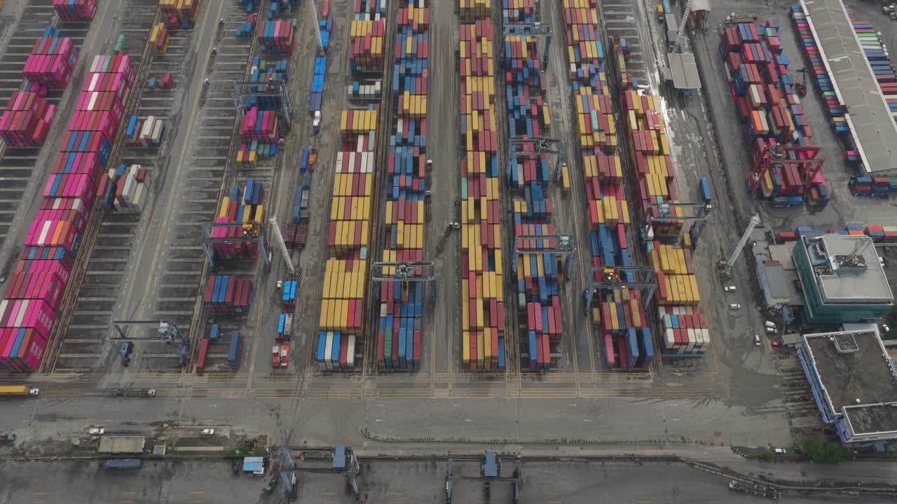 Overhead perspective of vibrant container terminal and active shipping port