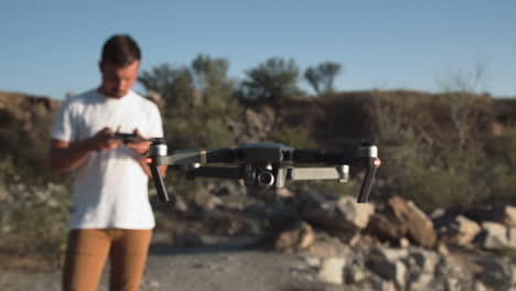drone pilot taking aerial photographs in outdoor setting