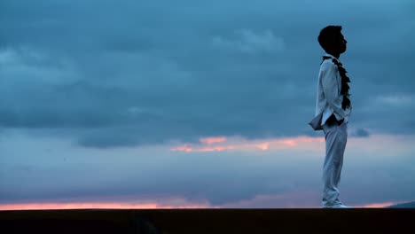 Wedding-groom-looks-to-the-right-at-Ala-Moana-Beach-Park-in-Honolulu-Hawaii