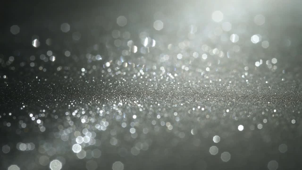 Rising upper-right light causing glittering plane shimmering in studio macro, shifting highlights