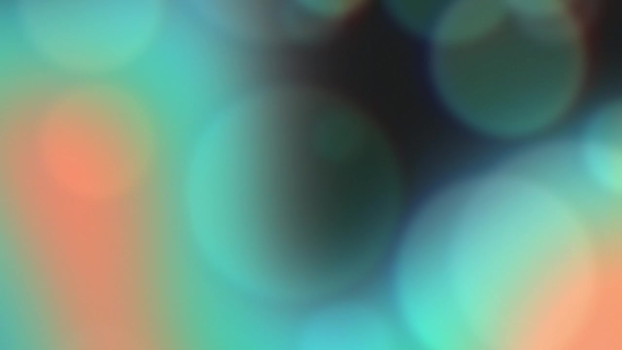 Abstract Background with Soft Glowing Teal and Orange Bokeh Circles
