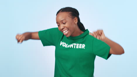 Volunteer-woman,-dance-and-smile-in-studio