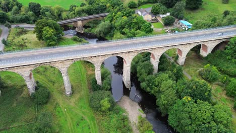 aerial flying toward newton cap viaduct over river wear in bishop auckland, county durham