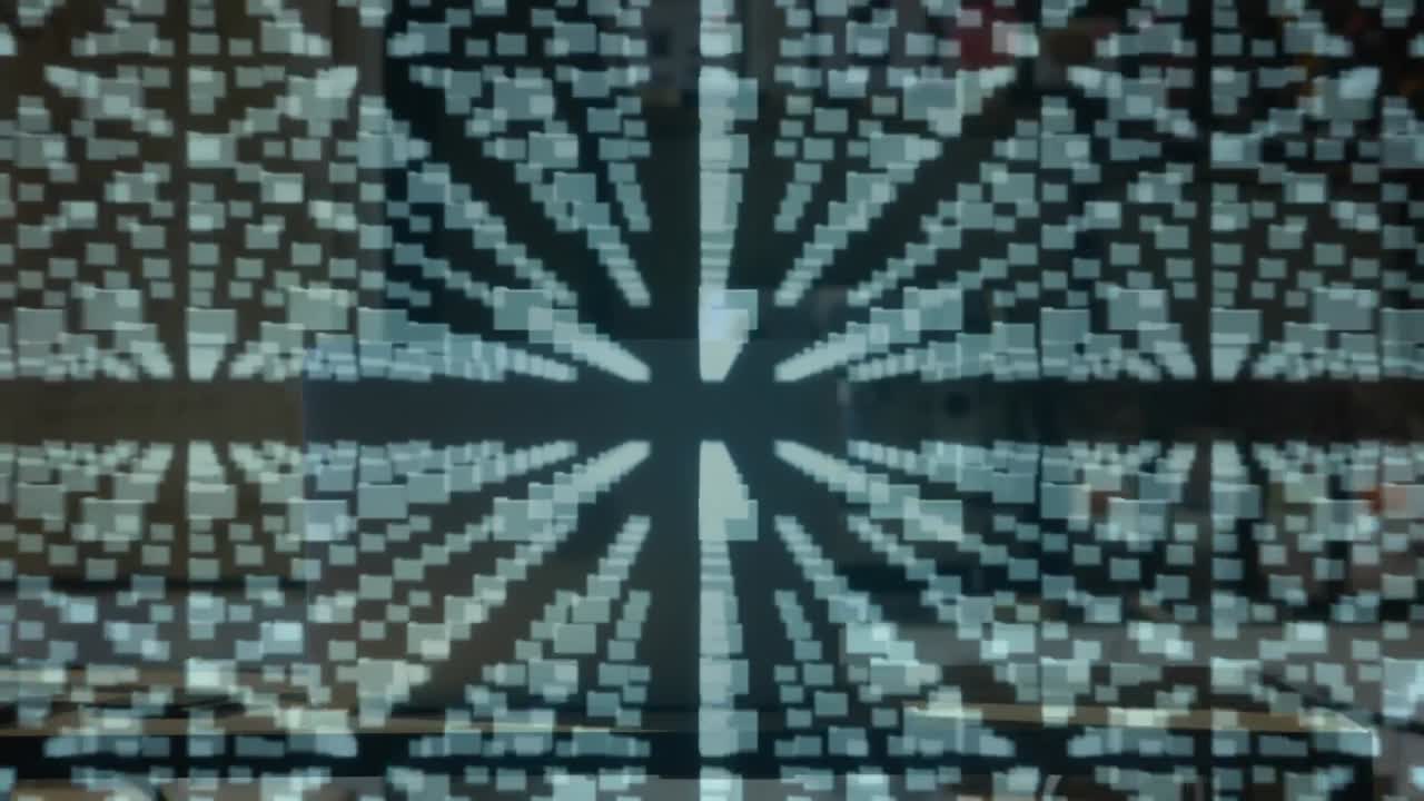 Animation of digital files and padlock over laptop on desk