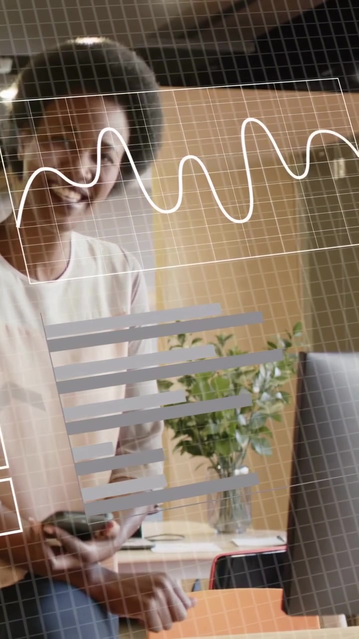 Vertical video: Woman holding phone, following colleague's hand, smiling and reviewing tech HUD