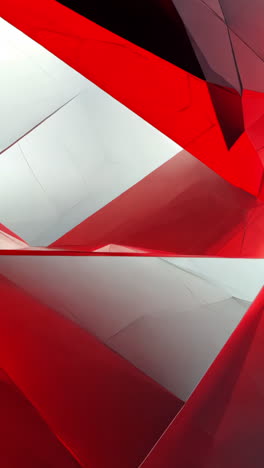 a red and white abstract design with a triangle shape. the red color is dominant and the white color is used as a background. the design has a modern and artistic feel to it