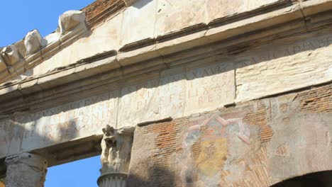 low angle shot of colonnaded portico of octavia ancient structure in the roman ghetto next to teatro di marcello in rome italy at daytime