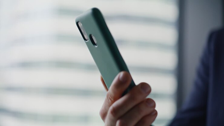Close-up of a hand holding a smartphone