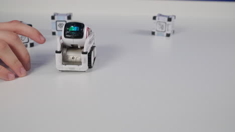 Child playing with a toy robot