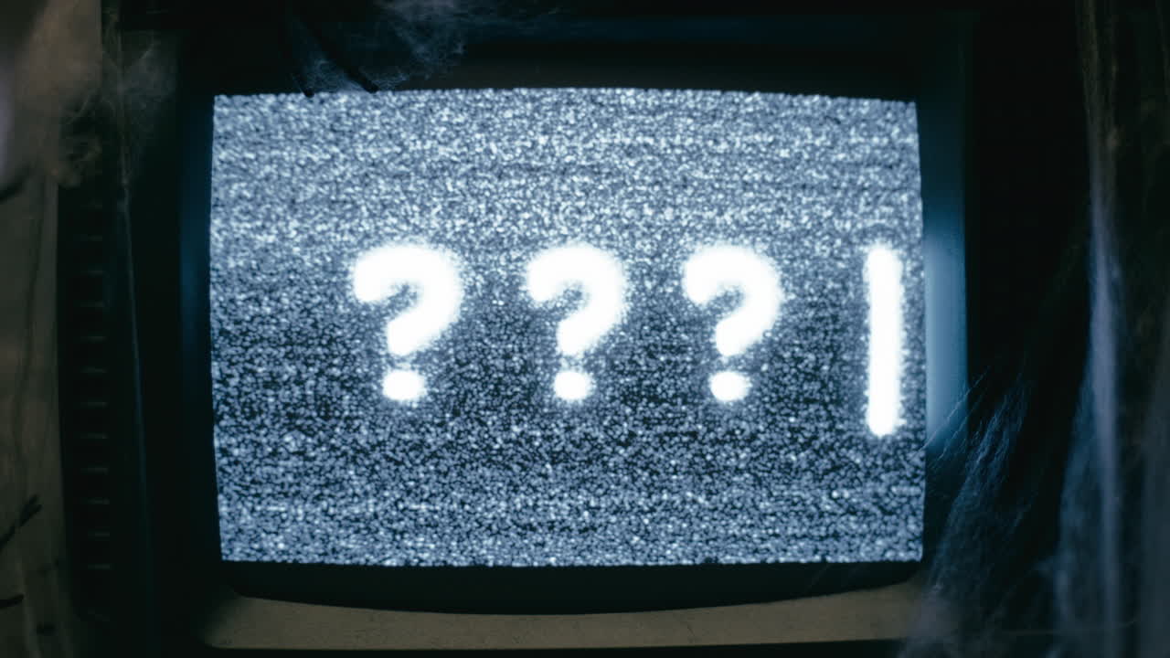 Writing Halloween Question Mark Symbols on a Vintage Noise TV