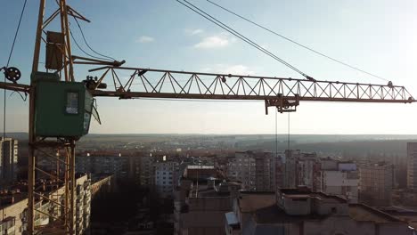 construction site with tower crane. construction site with working crane on sky and house district