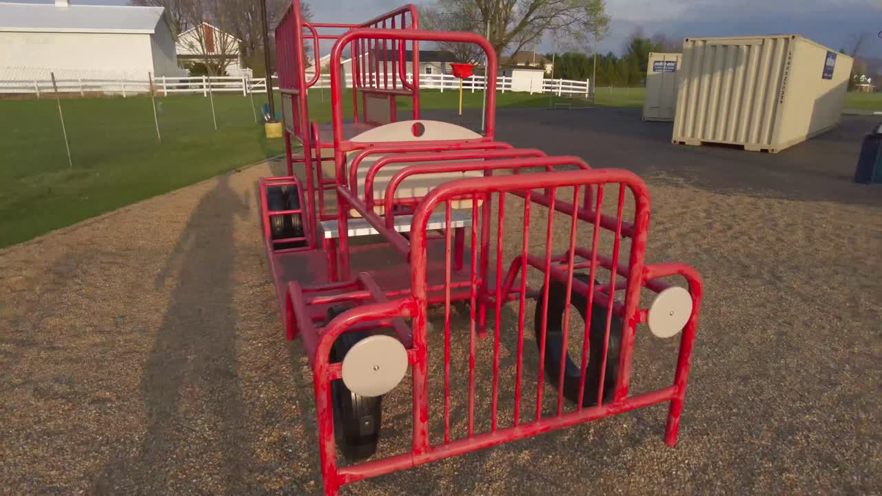Firetruck equipment at playground in the park.