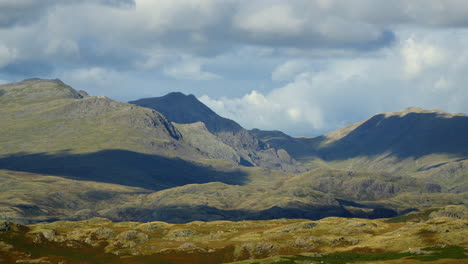 cloud shadows moving over mountains and rugged landscape