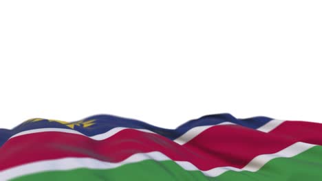 bandera de tela de namibia ondeando en el bucle del viento. estandarte de tela cosida de bordado de namib balanceándose en la brisa. fondo blanco medio lleno. lugar para el texto. bucle de 20 segundos.