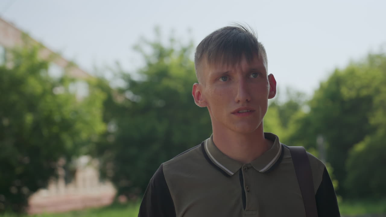 Youth Feels Nervous, Adolescent Exhibits Apprehension Amid Traffic And Public Setting Cues, Young Individual Displays Signs Of Unease While Observing Passing Cars And Busy Pavement Situations