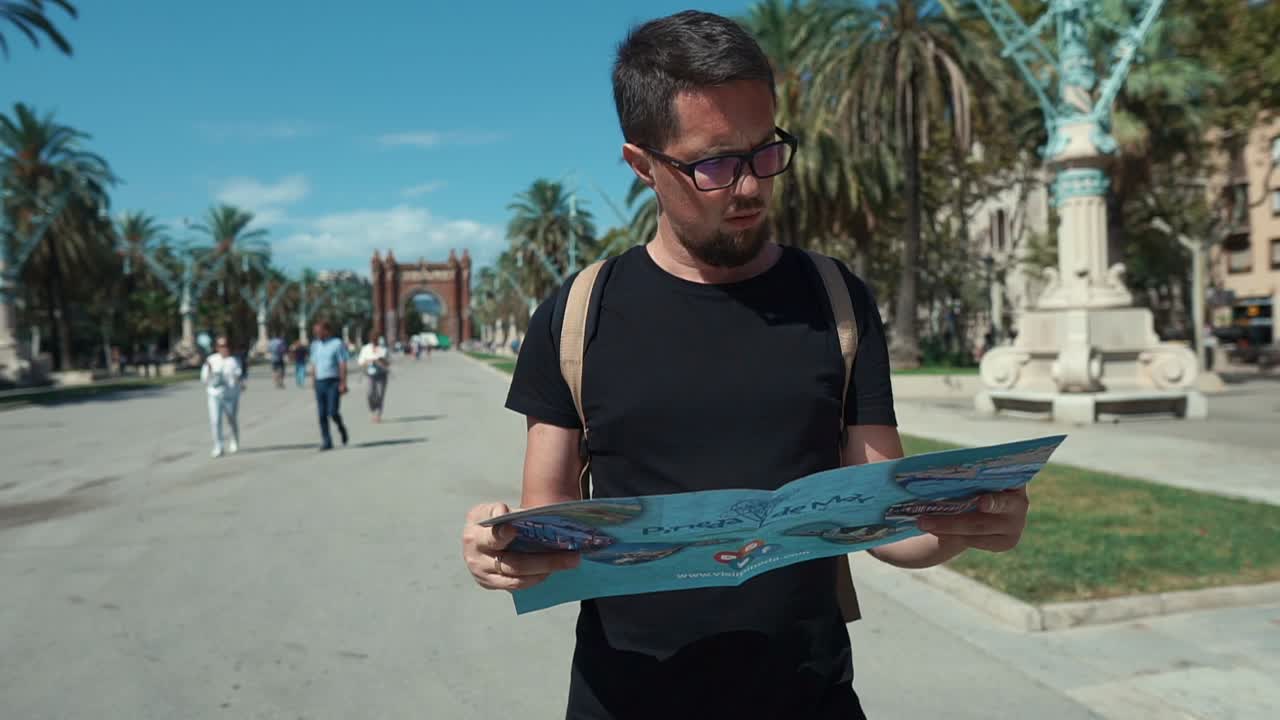 Tourist Reading Map in Barcelona