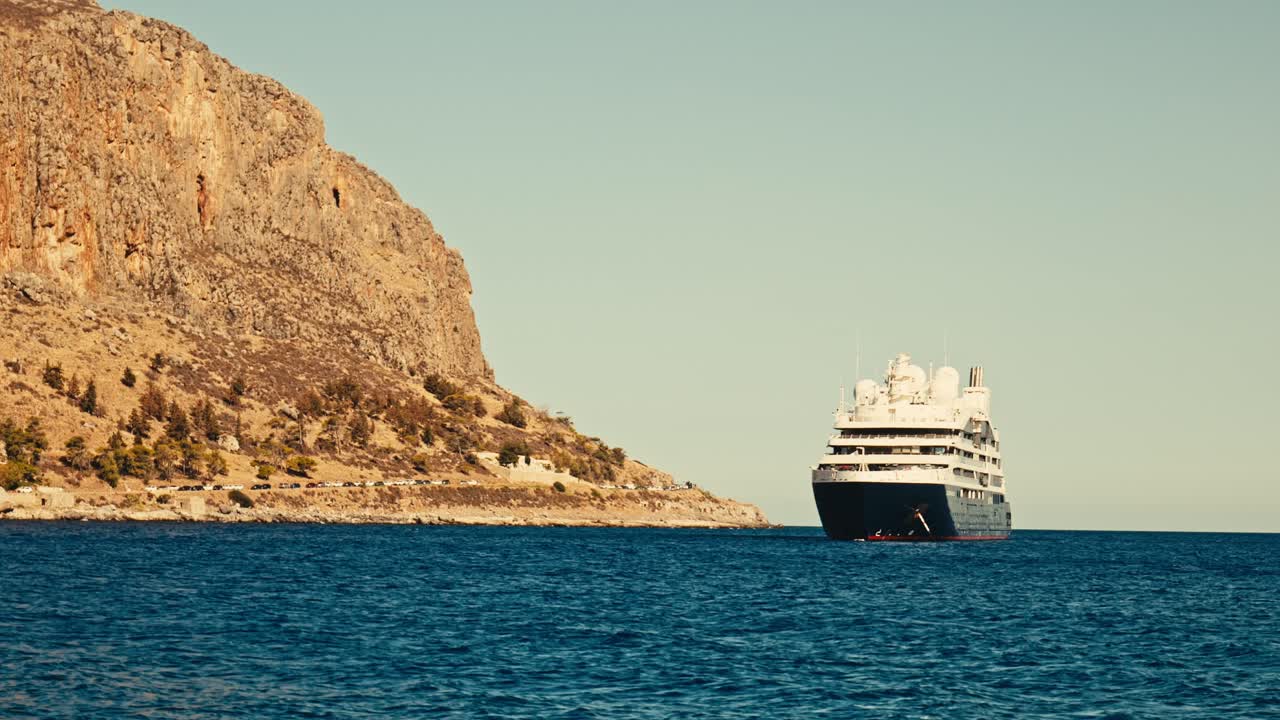 Greek island holiday cruise ship ranchored offshore island port