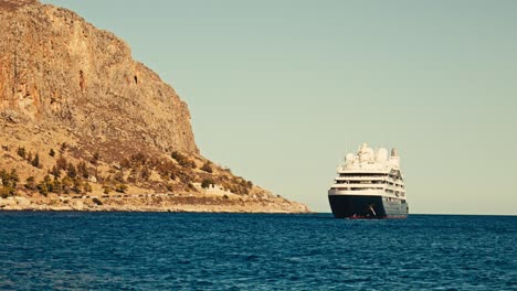 greek island holiday cruise ship ranchored offshore island port