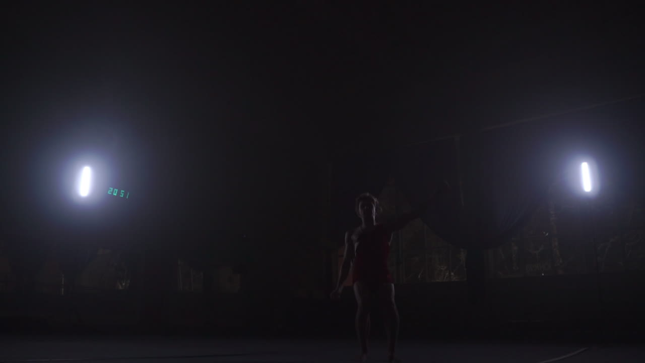 Gymnast gymnastic somersault exercise HD slow-motion video. Athlete salto