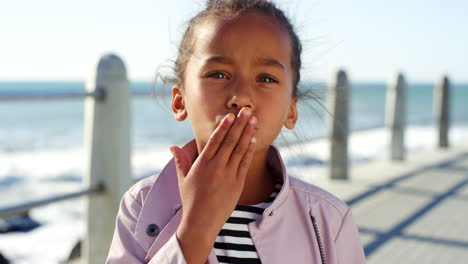 Child,-childhood-and-portrait-blowing-kiss-by