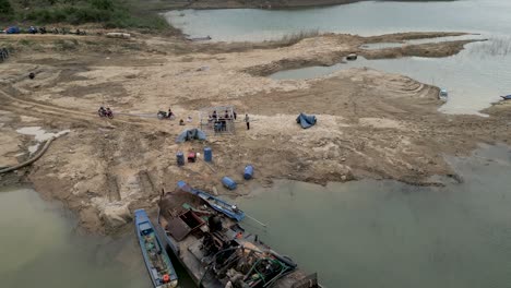 sand mining operation at a lake
