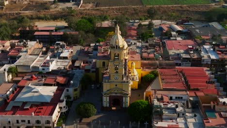 Up-close-aerial-orbit-left-to-right-of-Santuario-Diosesano's-facade-in-Tamazula