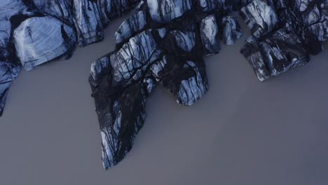 edge of solheimajokull an outlet glacier and lagoon in southern iceland